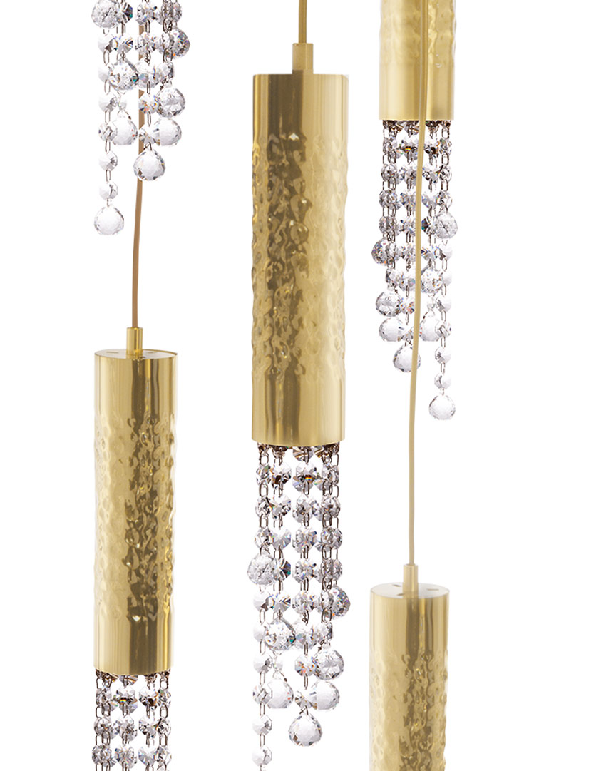 Moroccan-inspired Safi Suspension lighting with stacked gold-plated brass boxes and giraffe print texture