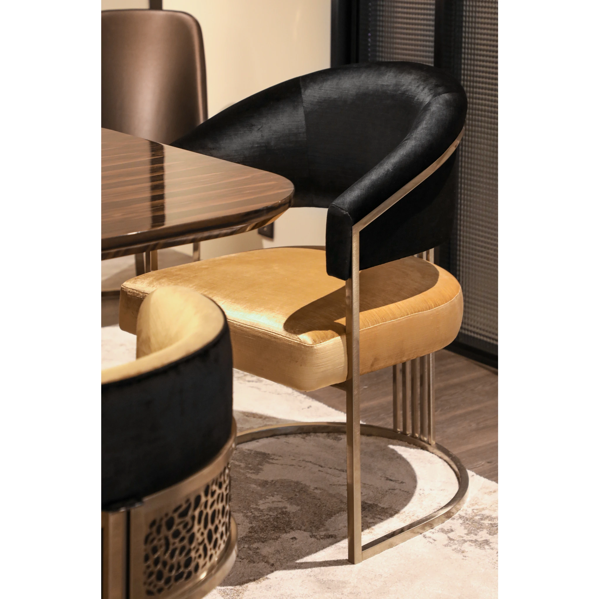 /storage/Luxury brass armchair with elegant harp-shaped design by Castro Interiors.