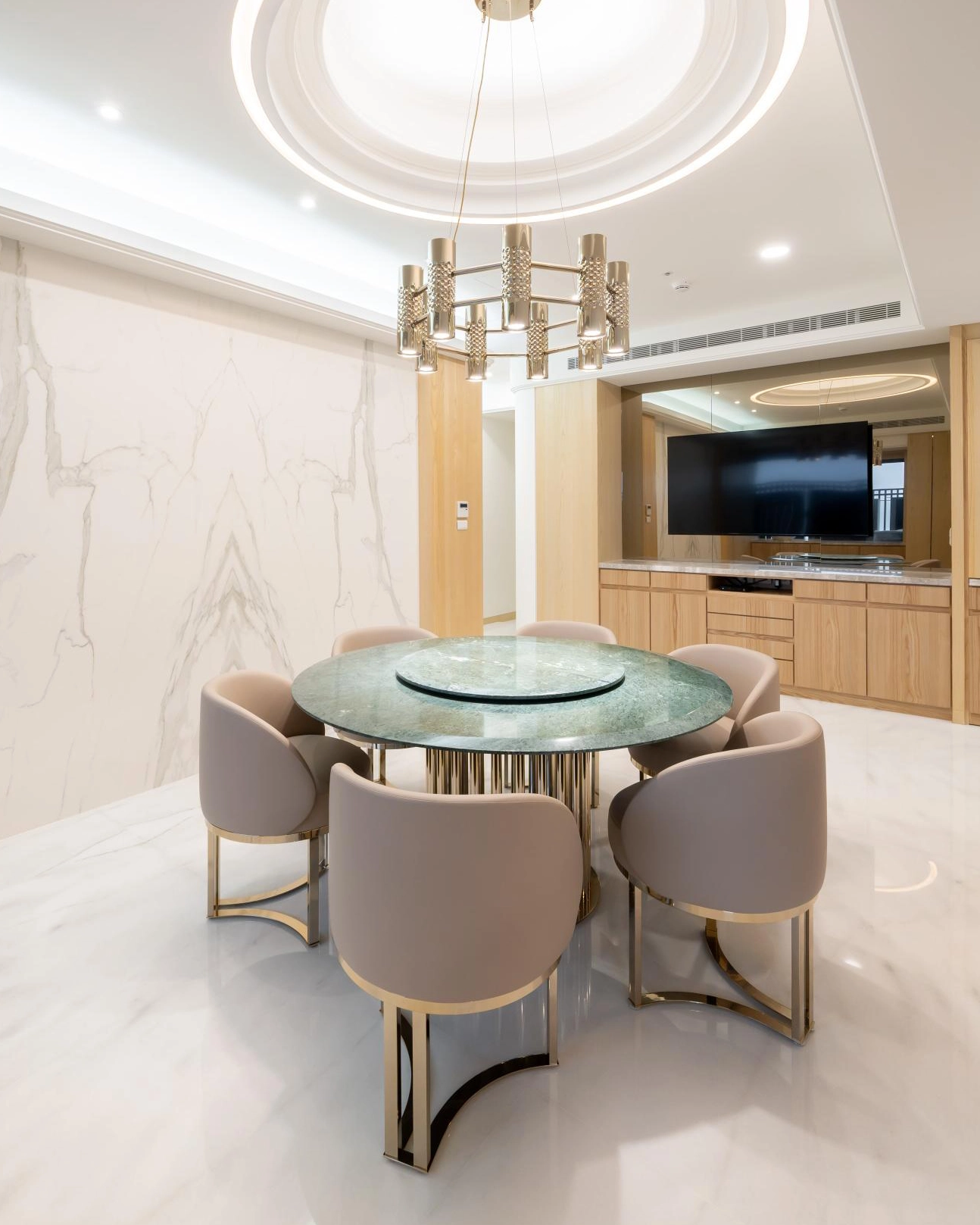 /storage/Luxury brass chair with beige leather upholstery and twisted brass detailing, blending feminine charm with refined contemporary design.