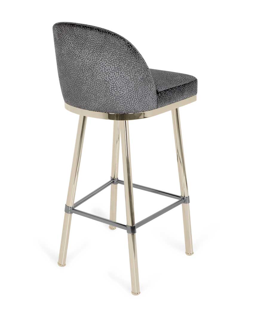 /storage/Luxury brass bar chair with gold-plated legs, black nickel accents, and curved upholstered body, blending Art Deco style with modern femininity.