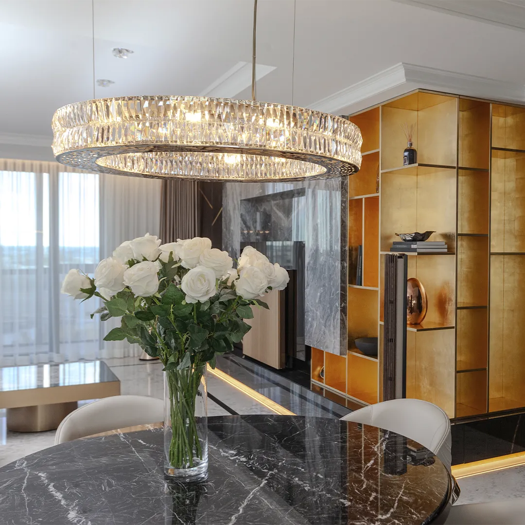 /storage/Luxury brass and crystal chandelier with layered gemstone design, handmade to create a dazzling and elegant lighting effect.