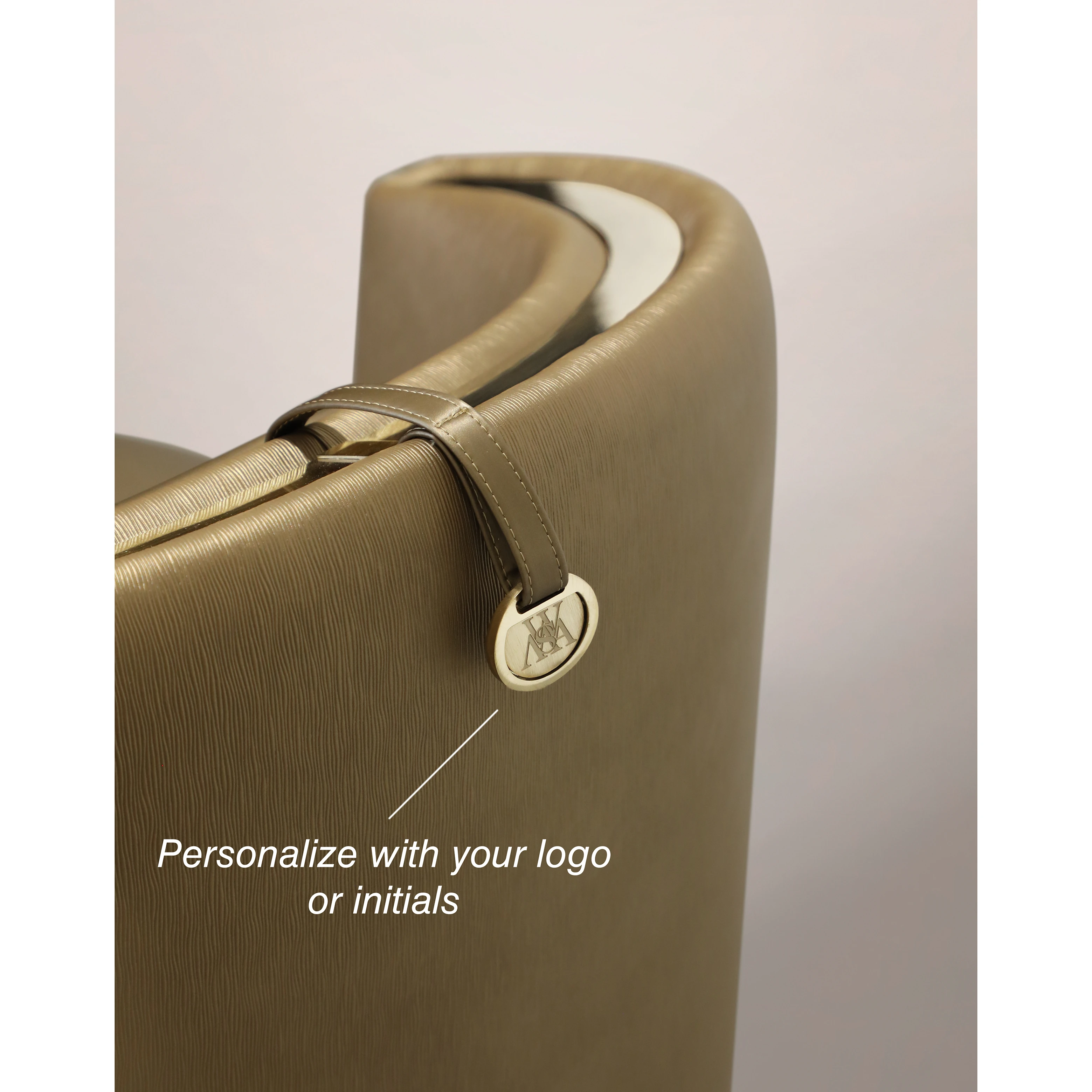 /storage/Luxury brass-accented modern lounge armchair with quilted padded fabric and smooth curves, combining comfort and elegance