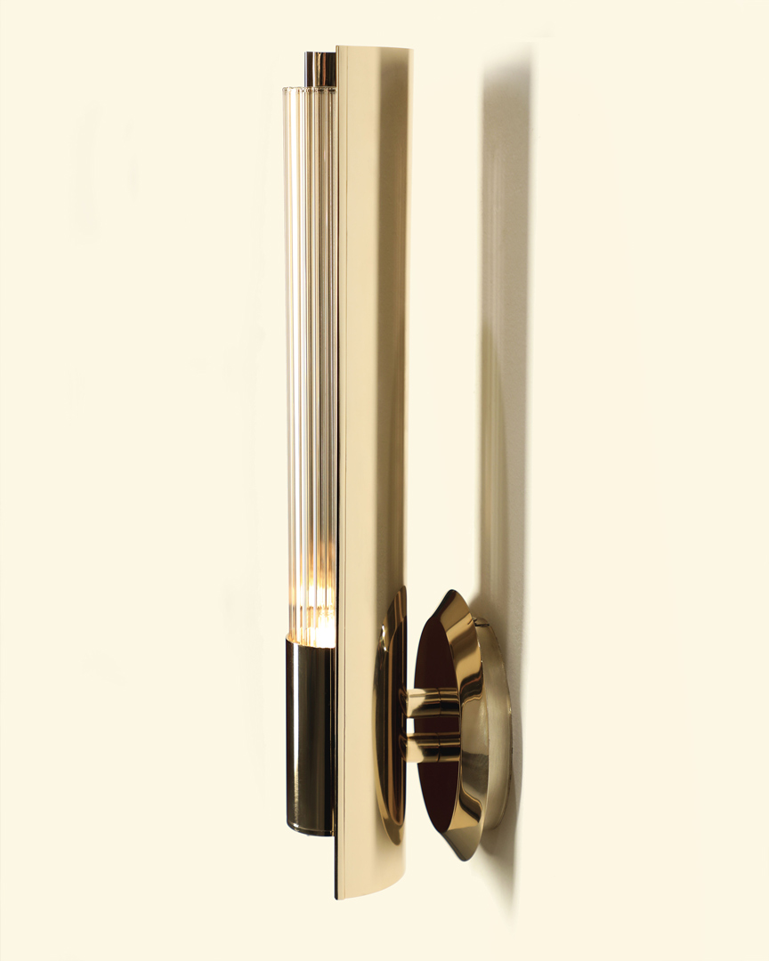 /storage/Luxury brass Baccara Wall Light with corrugated glass and refined futuristic design.
