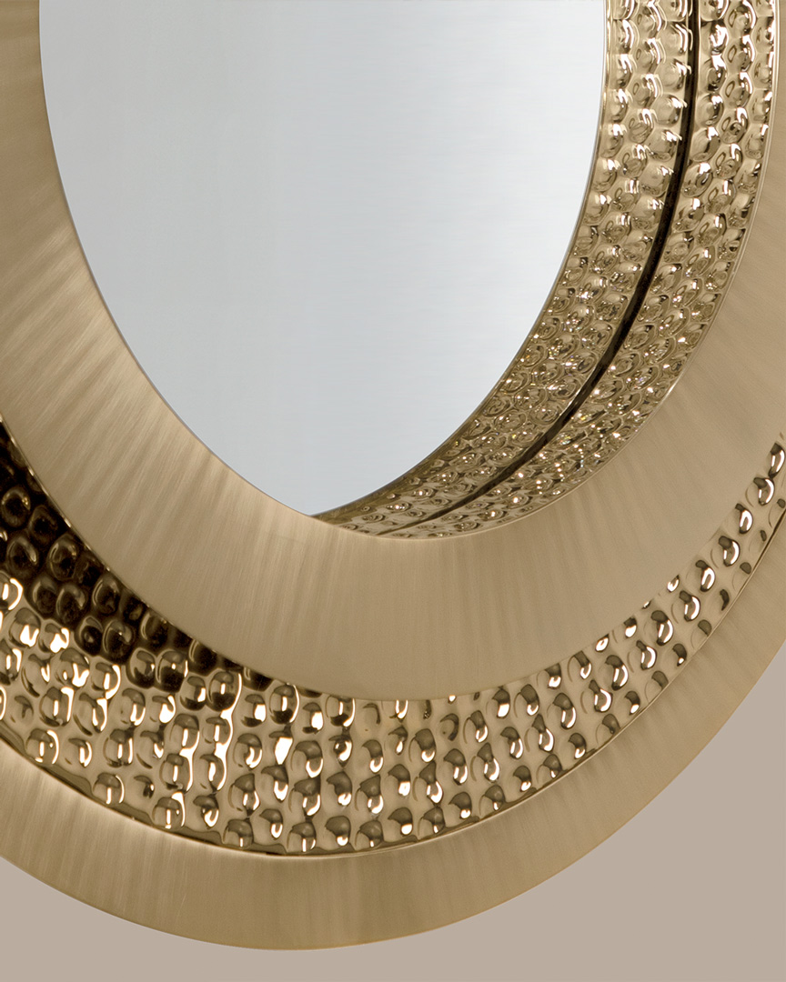 /storage/Luxury brass Golden Eye mirror, crafted in polished and hammered brass with a radiant 24k gold finish, inspired by James Bond’s cinematic elegance.