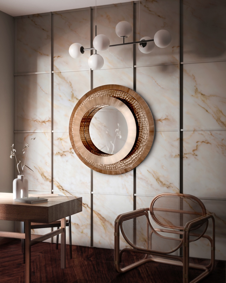 /storage/Luxury brass Golden Eye mirror, crafted in polished and hammered brass with a radiant 24k gold finish, inspired by James Bond’s cinematic elegance.
