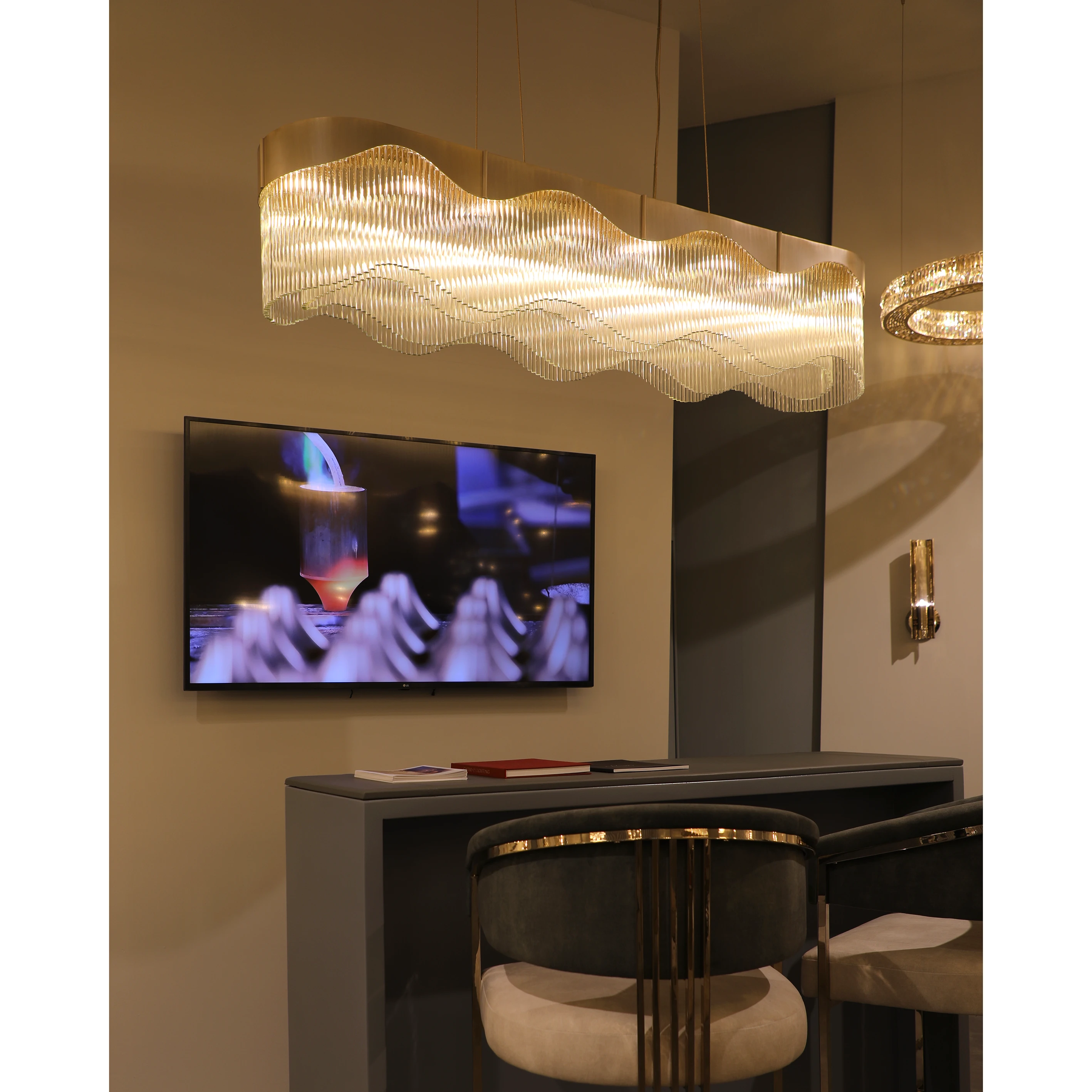 /storage/Luxury brass snooker chandelier with fluid curves and wave-inspired design, fully customizable in size and configuration for elegant modern interiors.