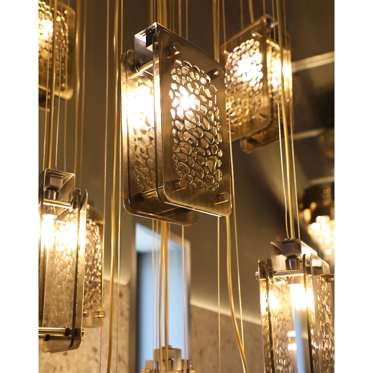 /storage/Luxury brass Safari Suspension with handcrafted giraffe print brass plates and bronze glass.
