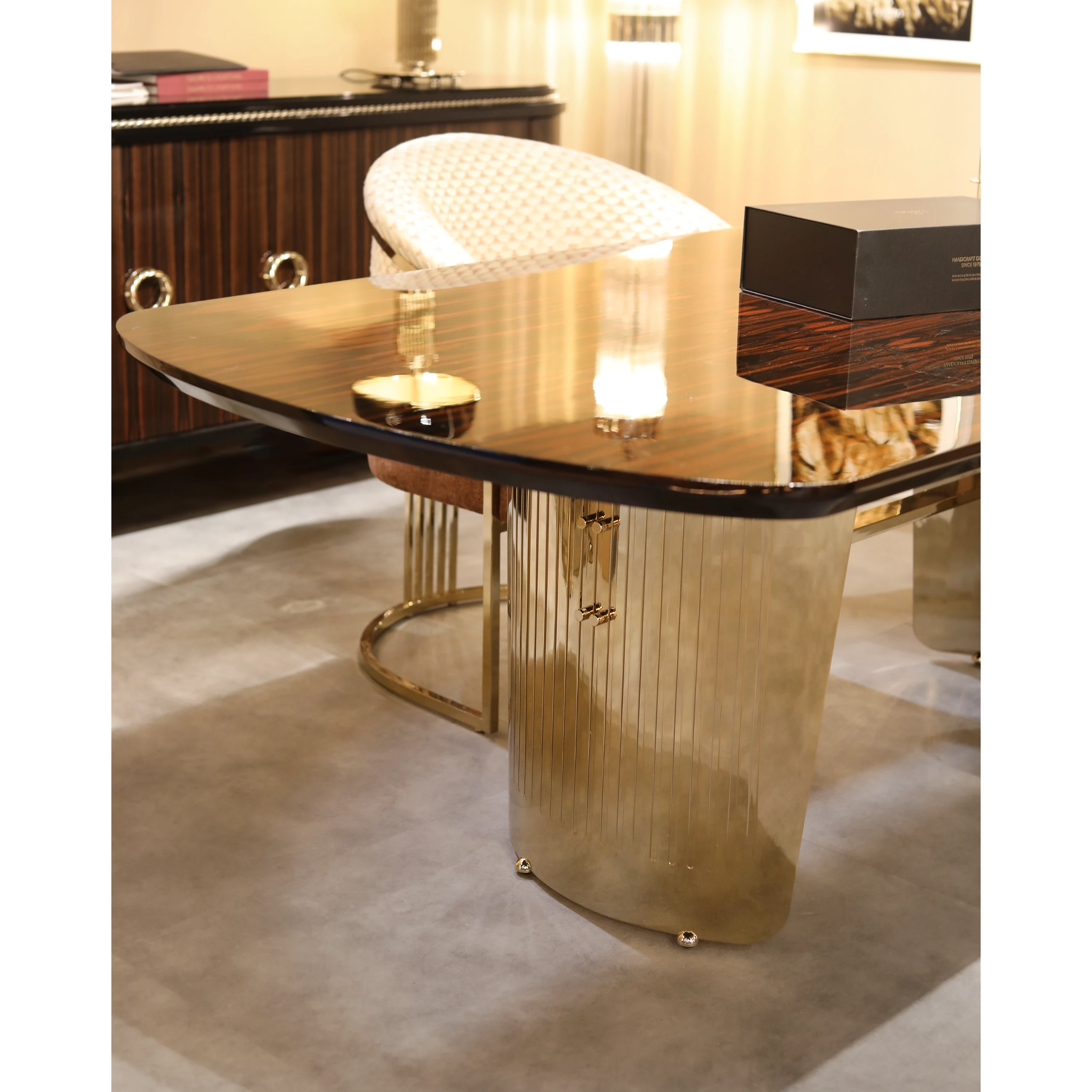 /storage/Luxury brass Moon Dining Table with natural wood and celestial-inspired design.