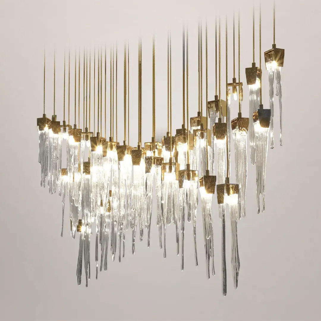 /storage/Luxury brass suspension with handcrafted crystal details inspired by natural stalactites, combining elegance and sculptural design.