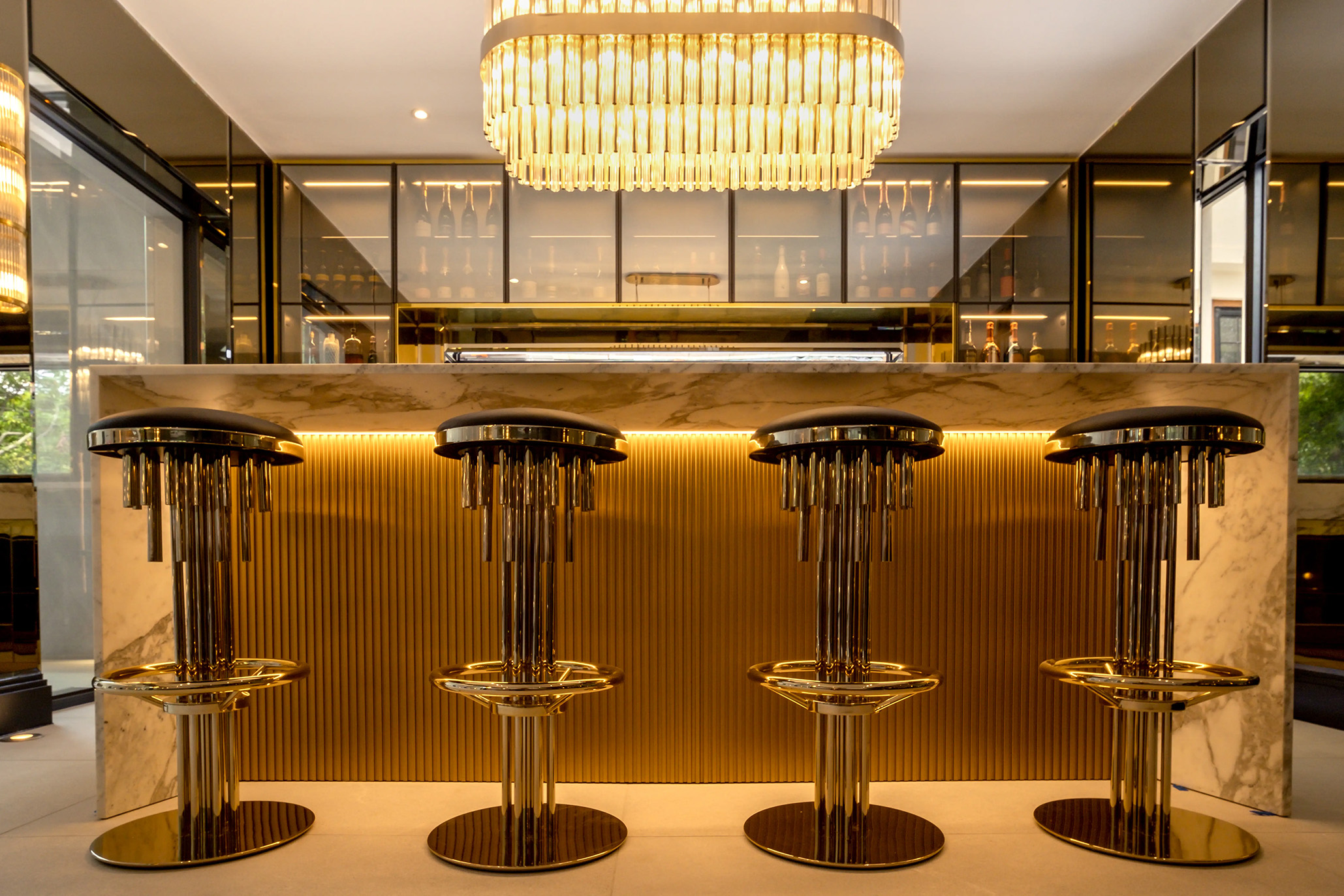 Halma Suspension by Castro Lighting featured in a modern luxury home bar