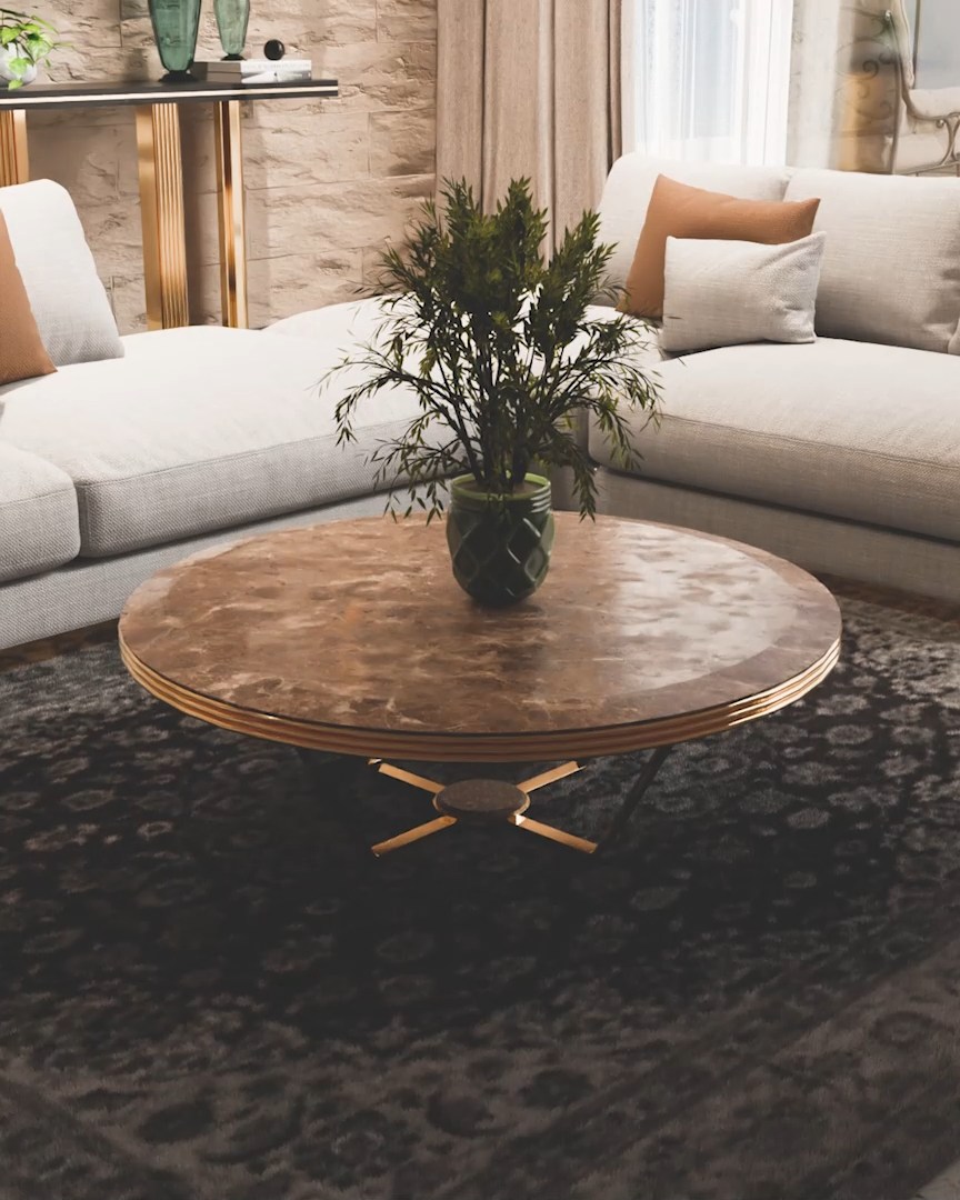 Euphoria Center Table in black Marquina marble with brass accents, shown in isolation to highlight its elegant silhouette and material contrast.