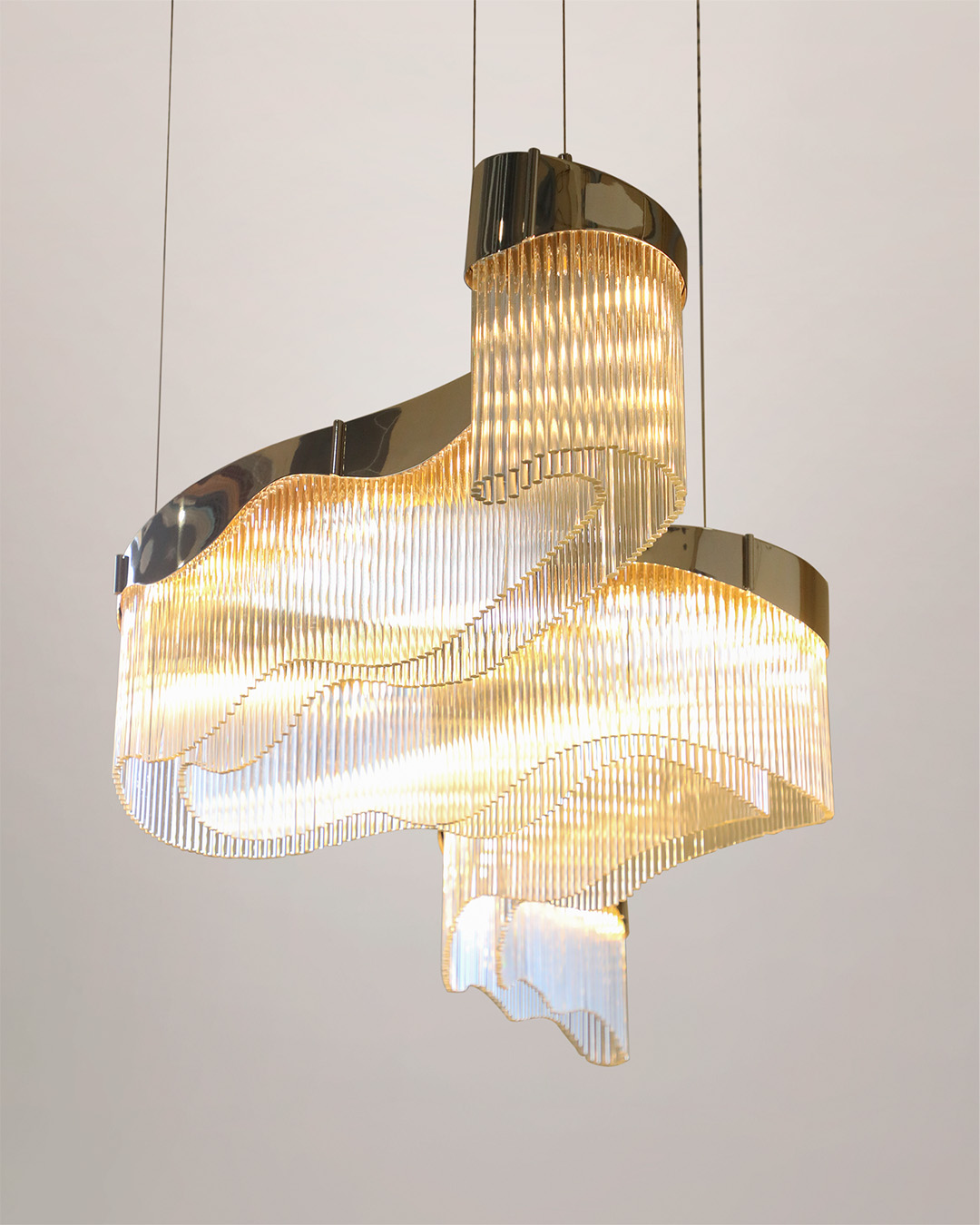 The Flow Suspension light fixture by Castro Lighting, made to a custom size, has dimensions of 2.7 meters in width, 1 meter in depth, and a height of 35 centimeters.