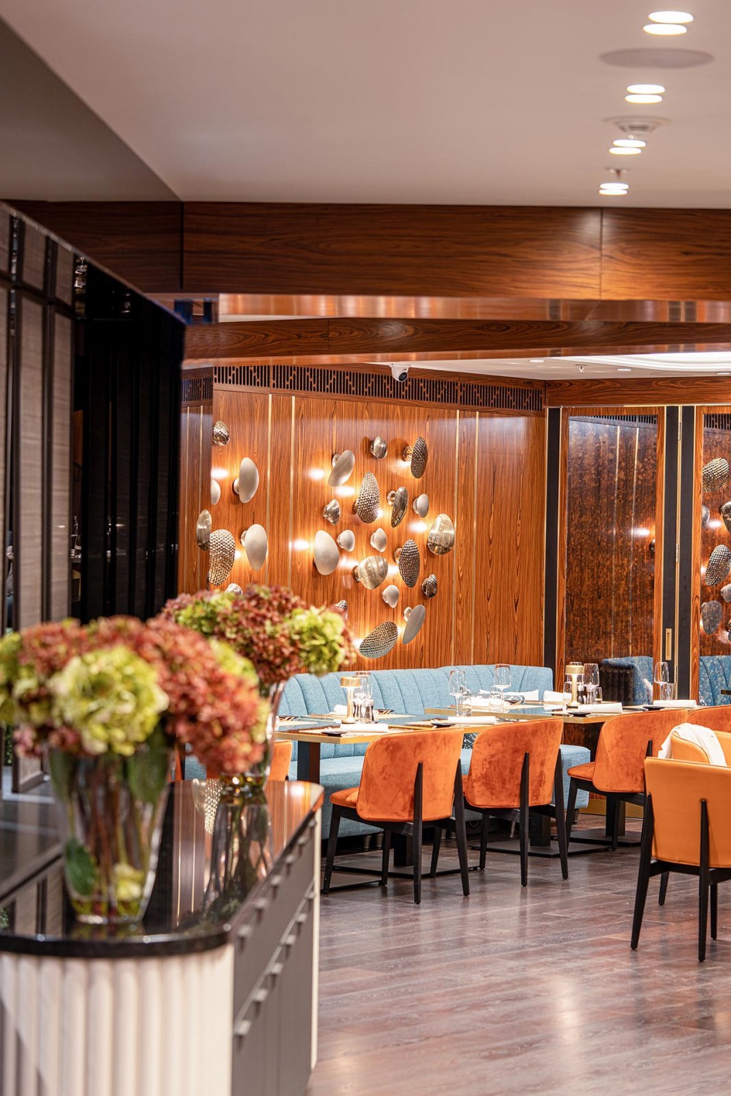 Mastery Wall Light in brass bringing sculptural elegance to the interiors of Ador Restaurant, InterContinental Sofia.