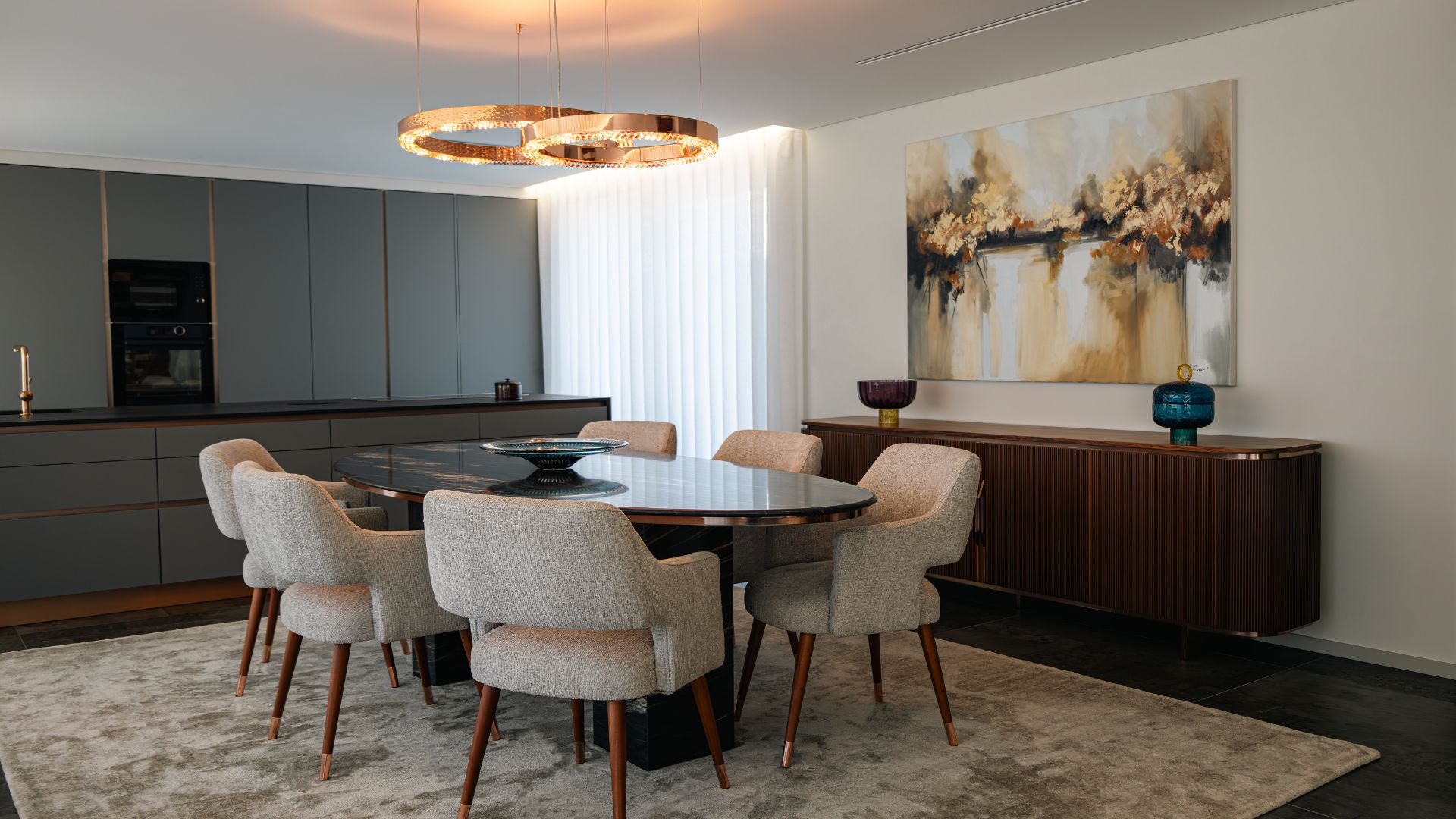 Metis Suspension by Castro Lighting in a refined dining interior designed by Alfaiate Interiores, featuring a copper brass finish that enhances the space with a warm and sophisticated glow.