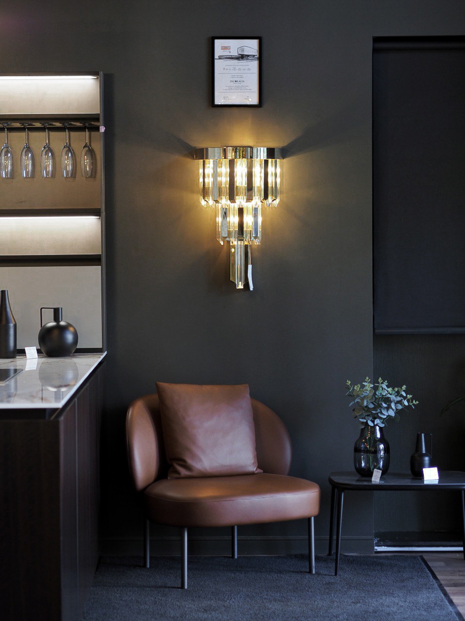 Illuminated Skylar Wall Light installed in the Decoracia showroom Moscow, highlighting refined craftsmanship and contemporary style.