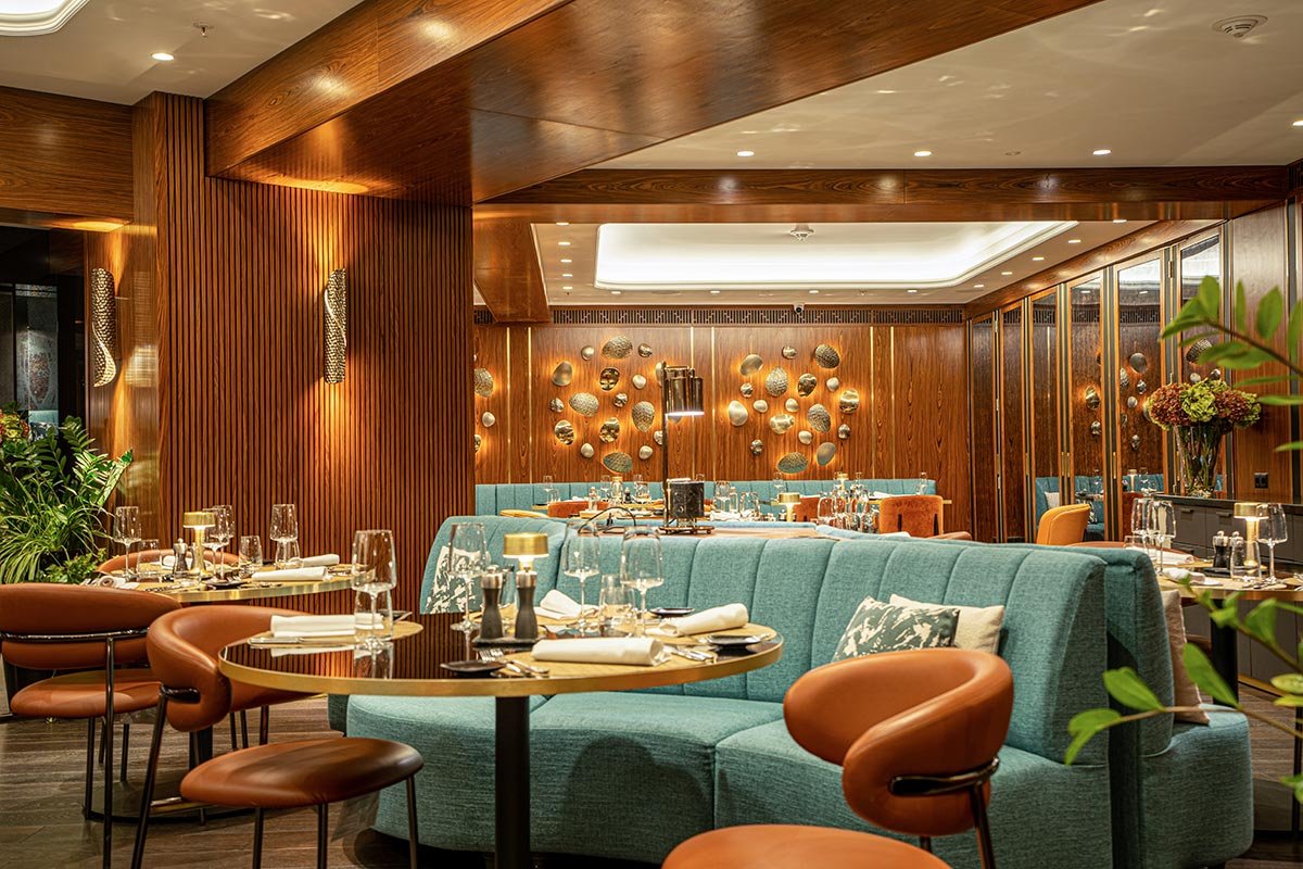 Spacium Suspension chandelier handcrafted from crystals, illuminating the dining area at Ador Restaurant, InterContinental Sofia.