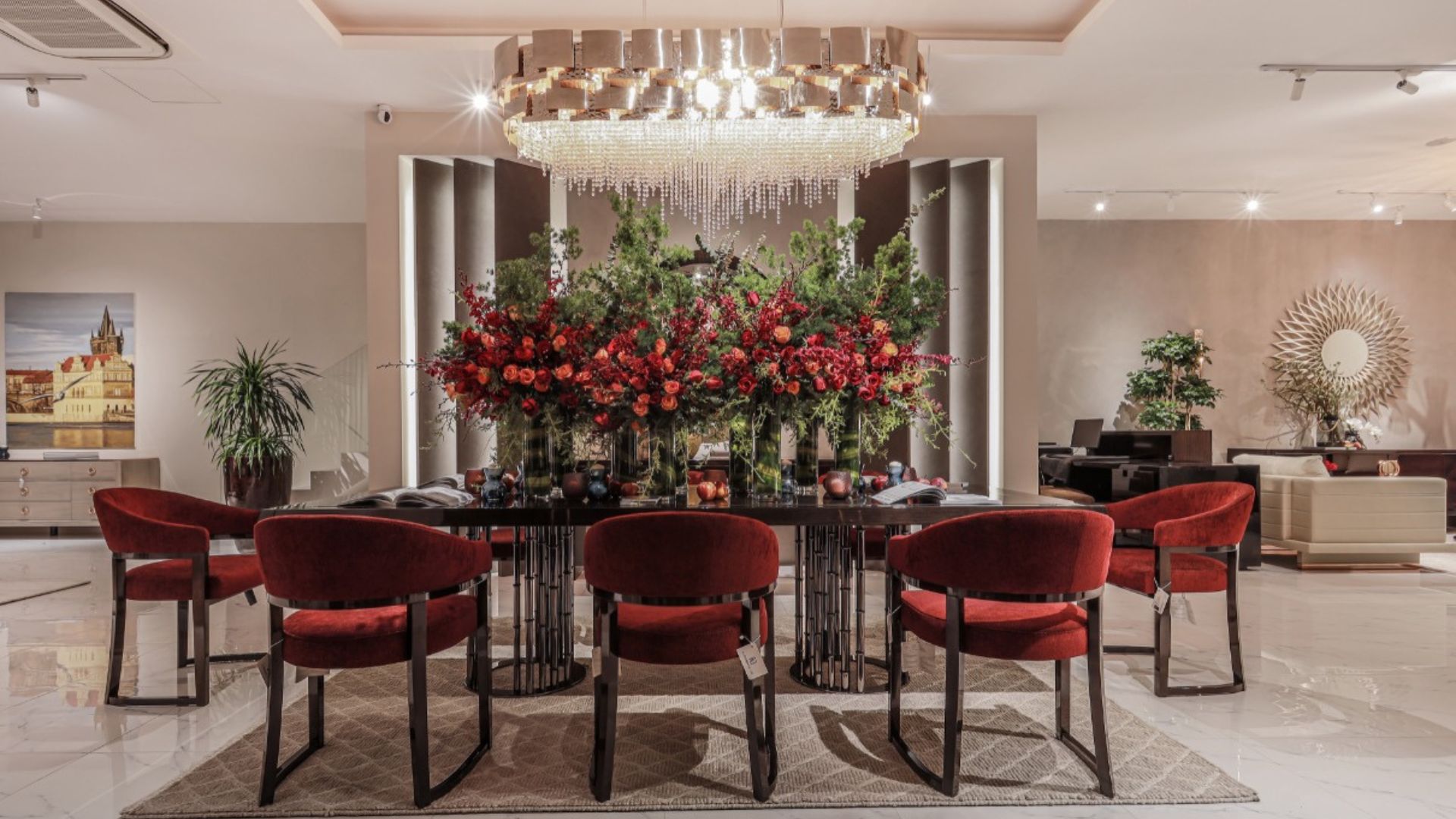 Modern dining room with Mondrian snooker suspension chandelier above dining table creating a statement lighting effect