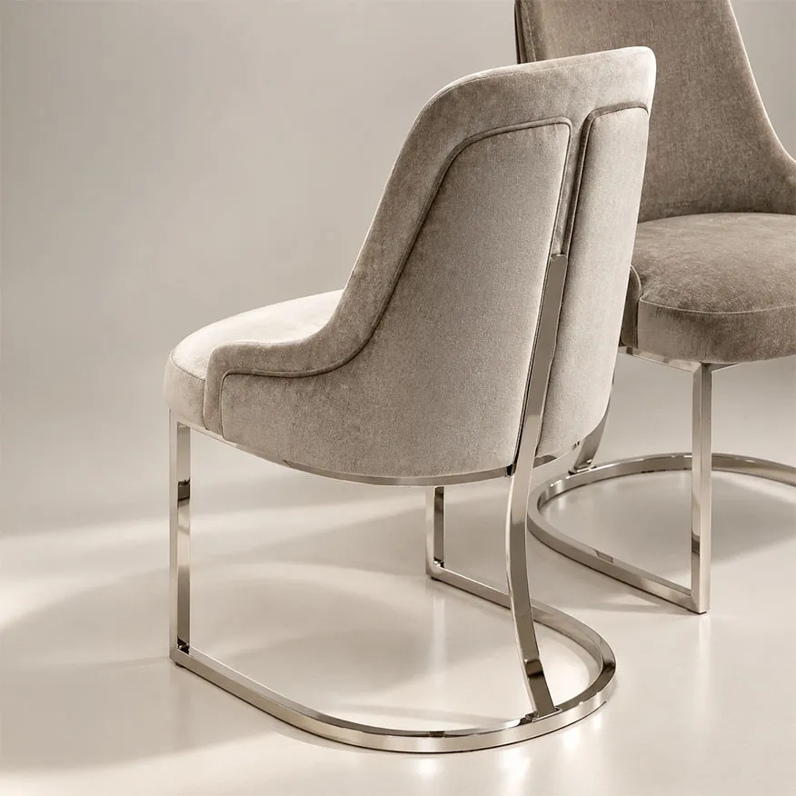 /storage/Luxury brass chair with gold-plated frame and upholstered seat, inspired by Greek elegance