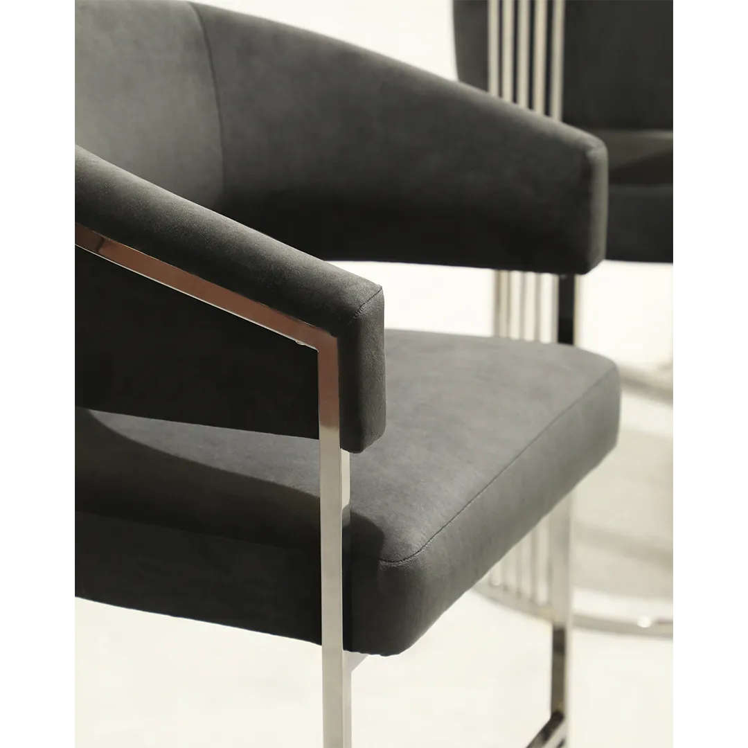 /storage/Luxury brass bar chair with elegant harp-shaped design by Castro Interiors.