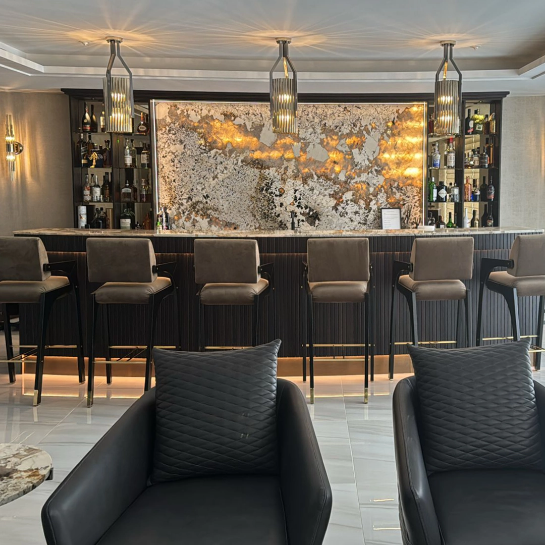 /storage/Luxury brass Avany pendant featuring a striking mix of gold and black nickel tubular shapes, designed as a bold modern lighting statement