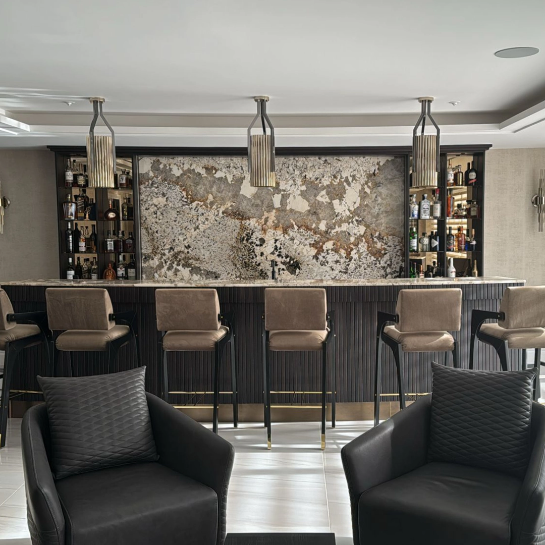 /storage/Luxury brass Avany pendant featuring a striking mix of gold and black nickel tubular shapes, designed as a bold modern lighting statement