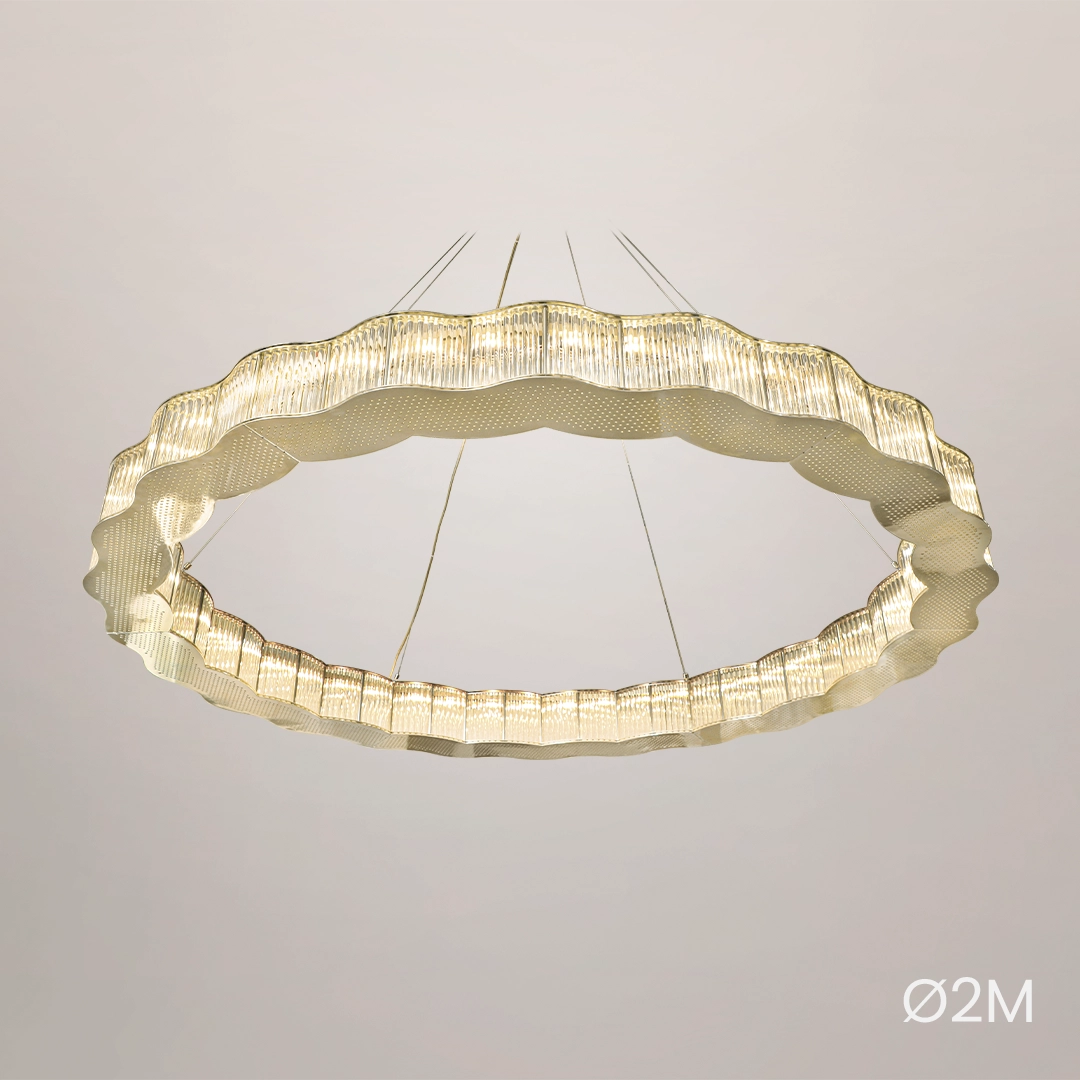 /storage/Luxury brass round suspension with faceted glass and rotating star details, combining Art Deco elegance with modern sophistication.