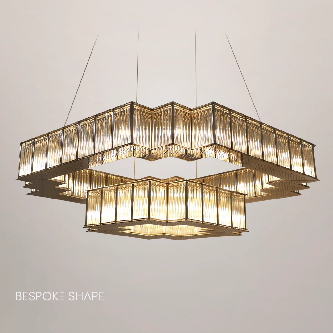 /storage/Luxury brass round suspension with faceted glass and rotating star details, combining Art Deco elegance with modern sophistication.