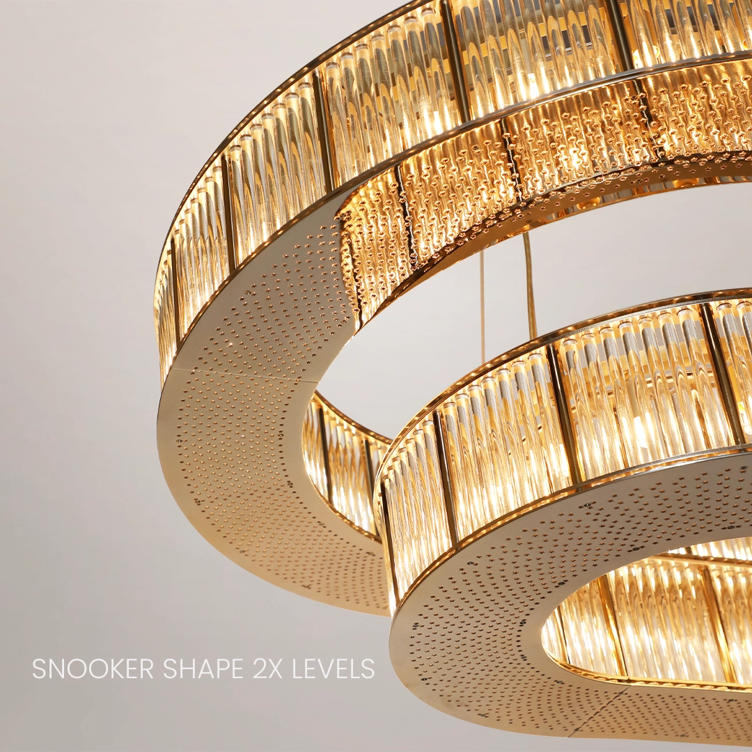 /storage/Luxury brass round suspension with faceted glass and rotating star details, combining Art Deco elegance with modern sophistication.