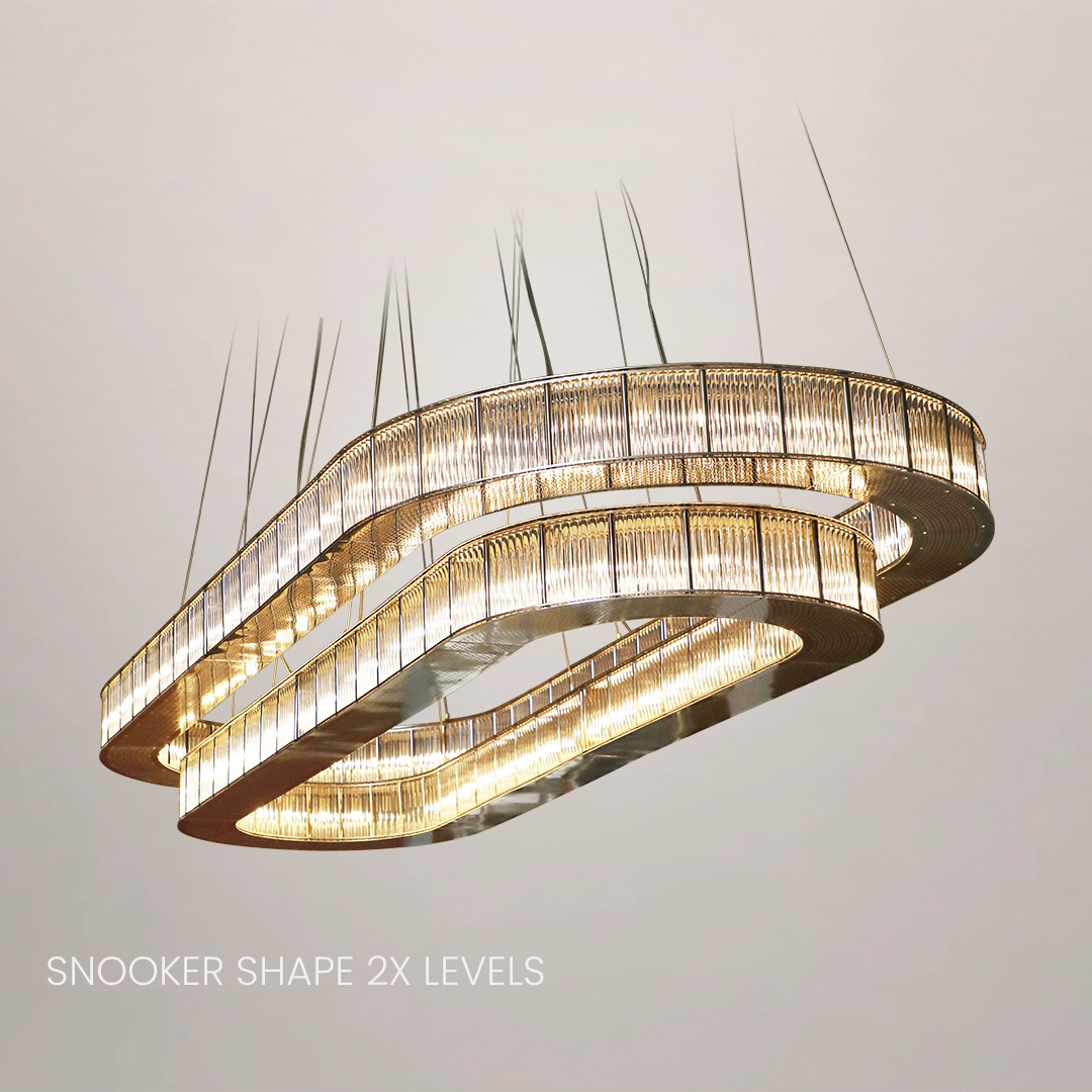/storage/Luxury brass round suspension with faceted glass and rotating star details, combining Art Deco elegance with modern sophistication.