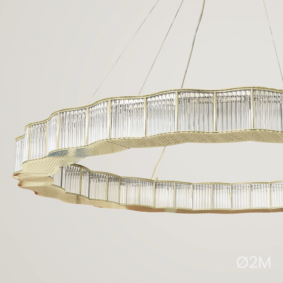 /storage/Luxury brass round suspension with faceted glass and rotating star details, combining Art Deco elegance with modern sophistication.