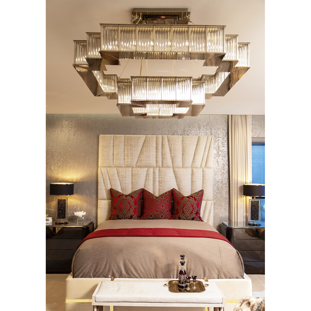 /storage/Luxury brass round suspension with faceted glass and rotating star details, combining Art Deco elegance with modern sophistication.