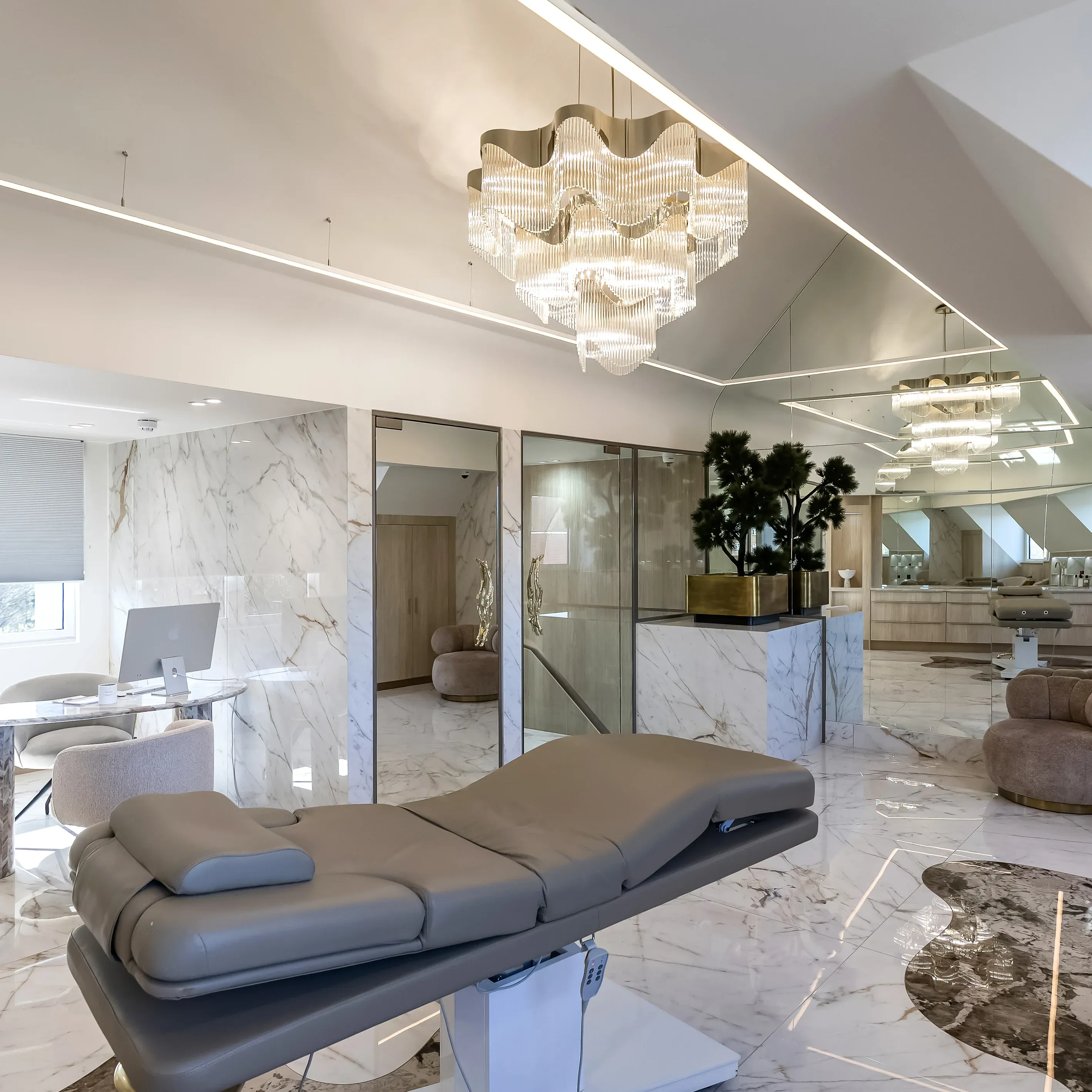 /storage/Luxury brass chandelier with sculptural curves and abstract design by Castro Lighting