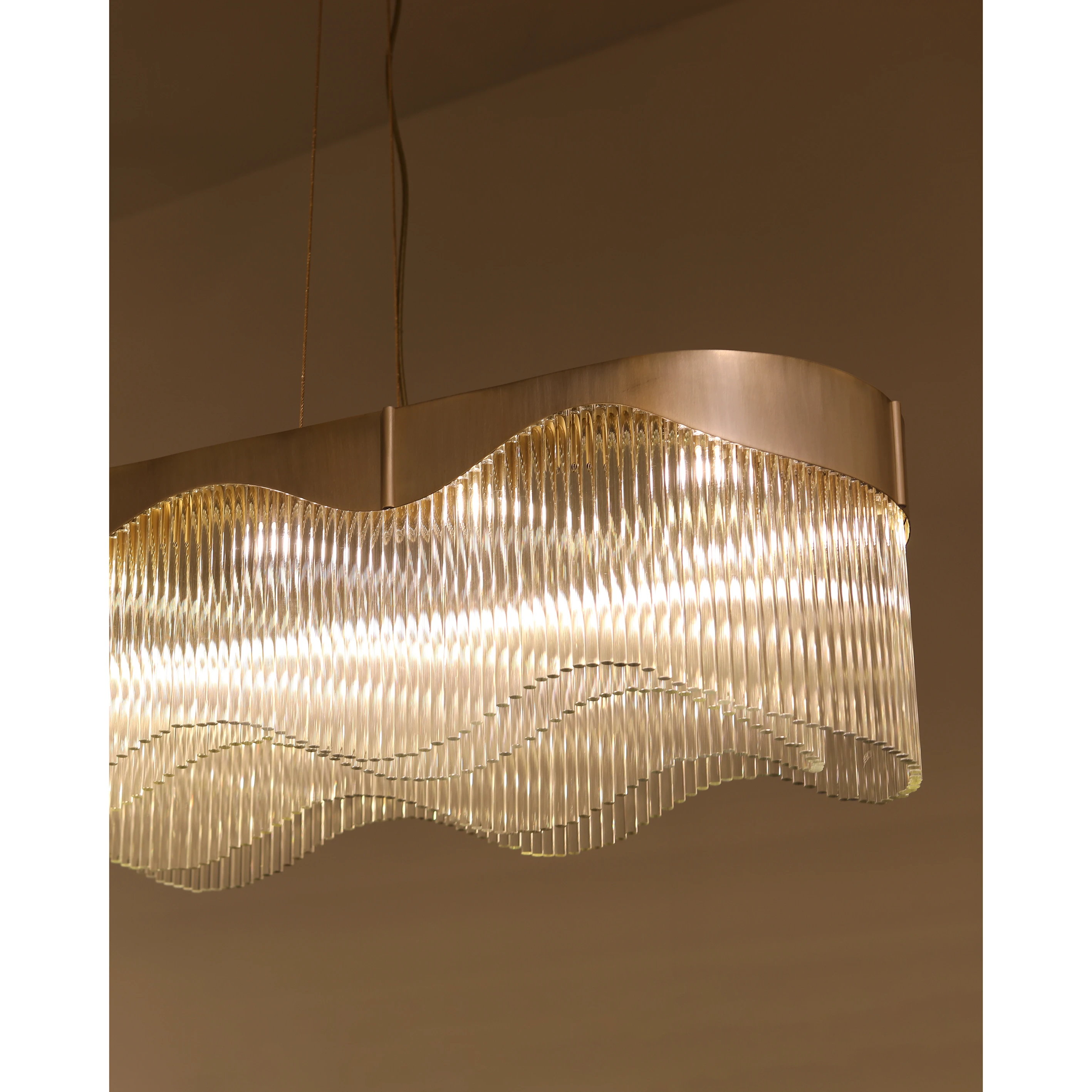 /storage/Luxury brass snooker chandelier with fluid curves and wave-inspired design, fully customizable in size and configuration for elegant modern interiors.