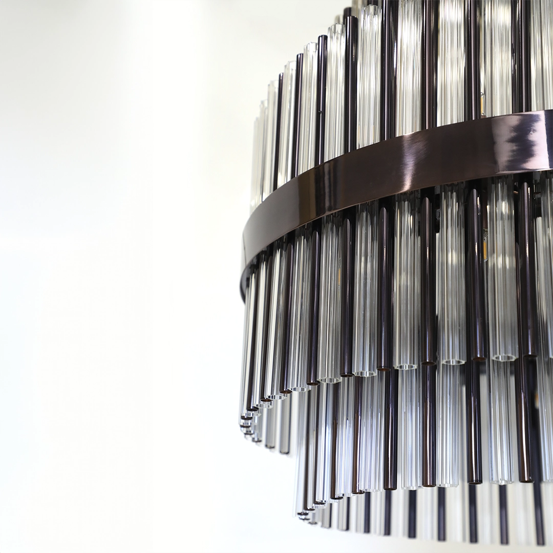 /storage/Luxury brass suspension with clear crystal glass elements, featuring a geometric-inspired design that blends elegance and modern sophistication.