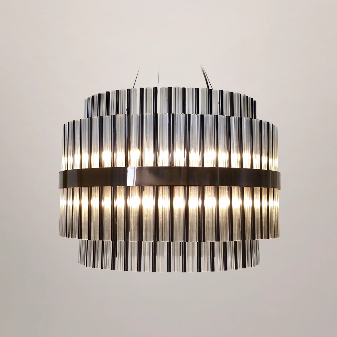 /storage/Luxury brass suspension with clear crystal glass elements, featuring a geometric-inspired design that blends elegance and modern sophistication.