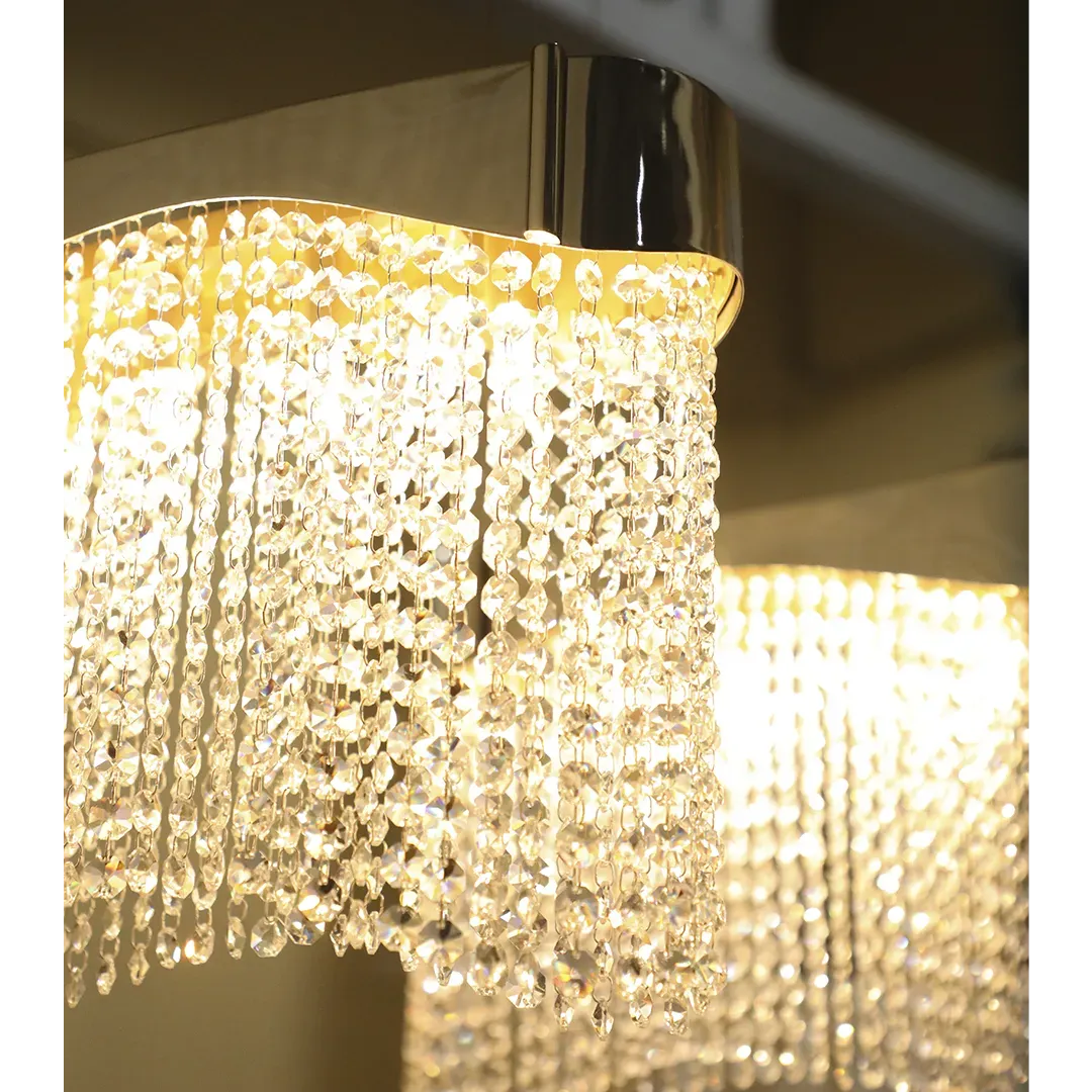 /storage/Luxury brass suspension with fluid curved design and customizable features, offering elegant modern lighting with a sense of movement.