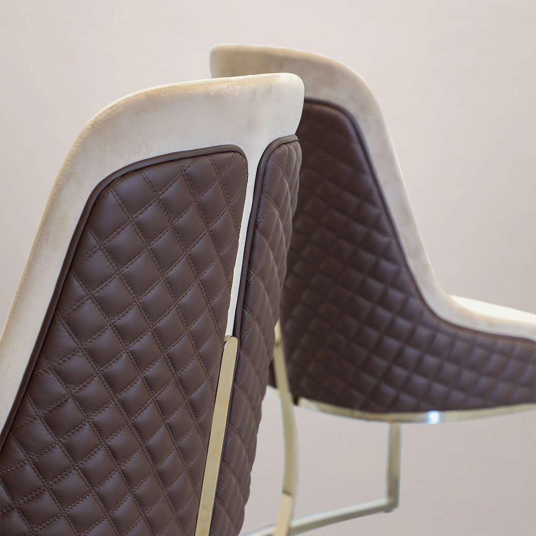 /storage/Luxury brass chair with gold-plated frame and upholstered seat, inspired by Greek elegance
