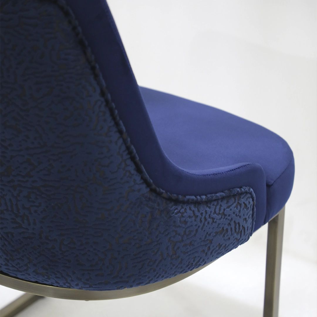 /storage/Luxury brass chair with gold-plated frame and upholstered seat, inspired by Greek elegance
