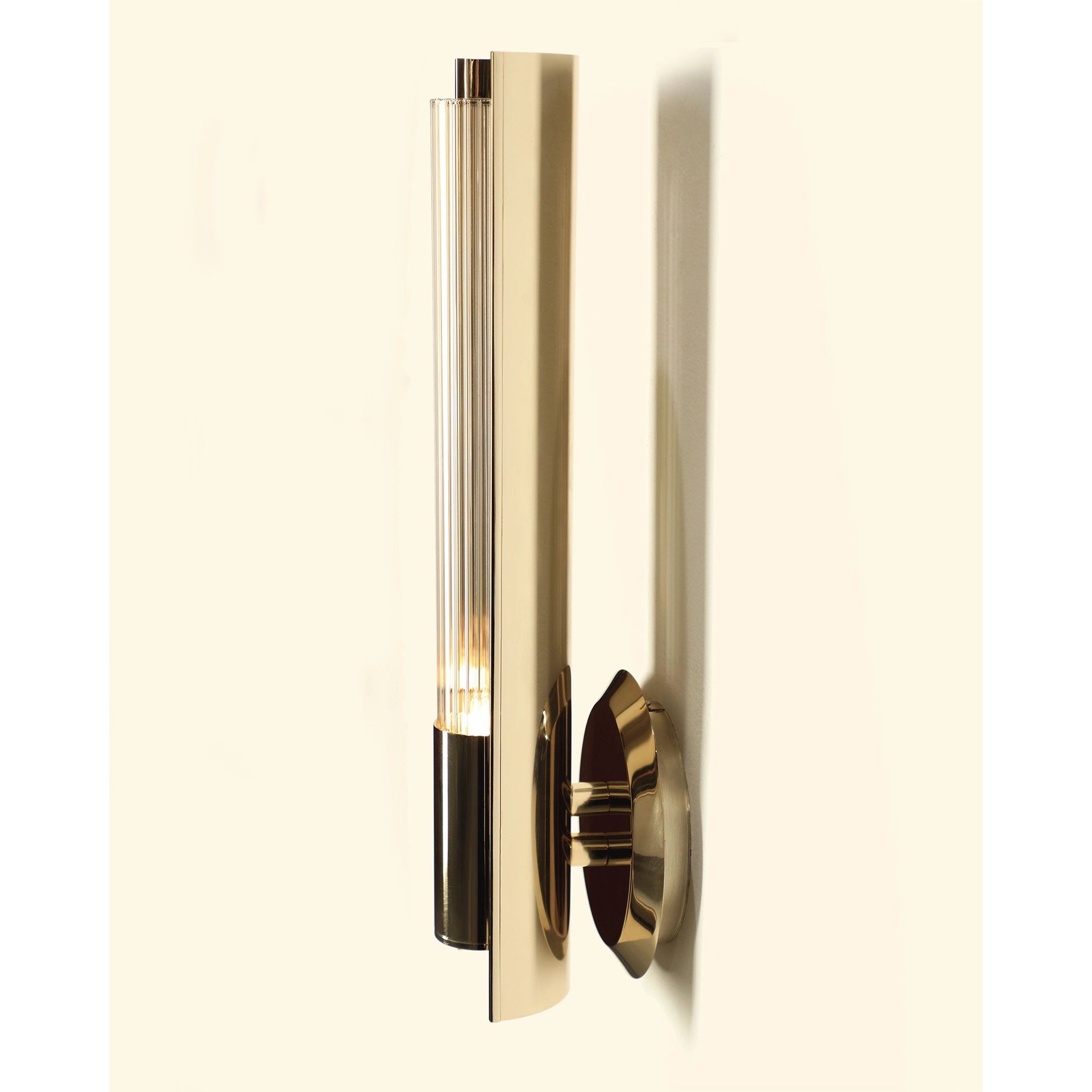 /storage/Luxury brass Baccara Wall Light with corrugated glass and refined futuristic design.
