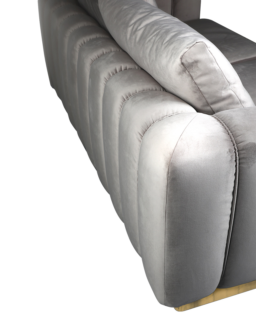 /storage/Luxury brass Colombo lounge sofa with gold-plated brass frame, plush cushions, and sculptural contemporary design.
