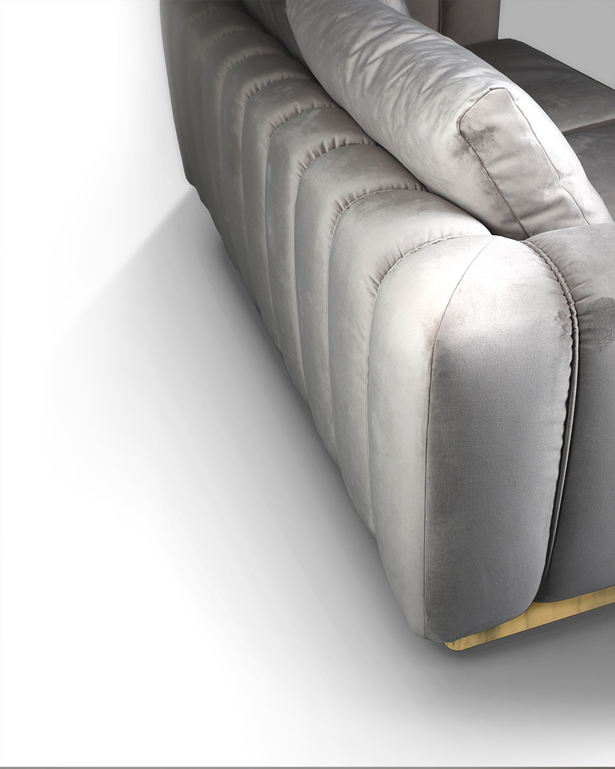 /storage/Luxury brass Colombo sofa with plush cushions and gold-plated brass frame, inspired by Joe Colombo’s iconic design for timeless comfort and elegance.