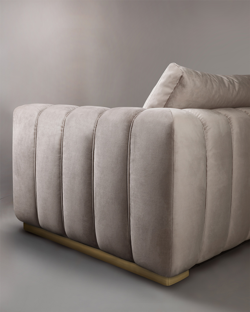 /storage/Luxury brass Colombo sofa with plush cushions and gold-plated brass frame, inspired by Joe Colombo’s iconic design for timeless comfort and elegance.