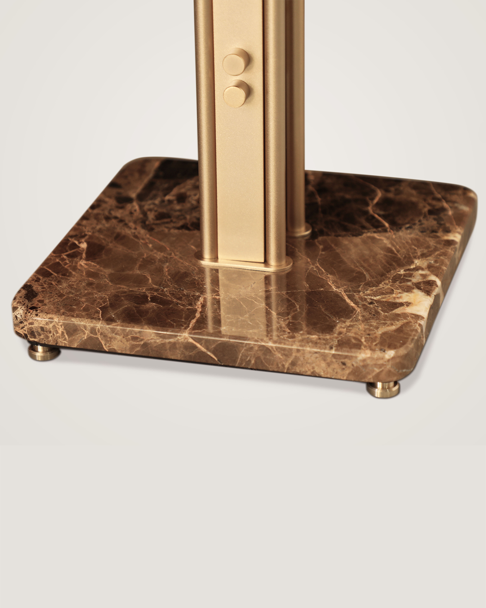 /storage/Luxury brass Columns Center Table with marble top, a modern geometric design exuding elegance and sophistication.