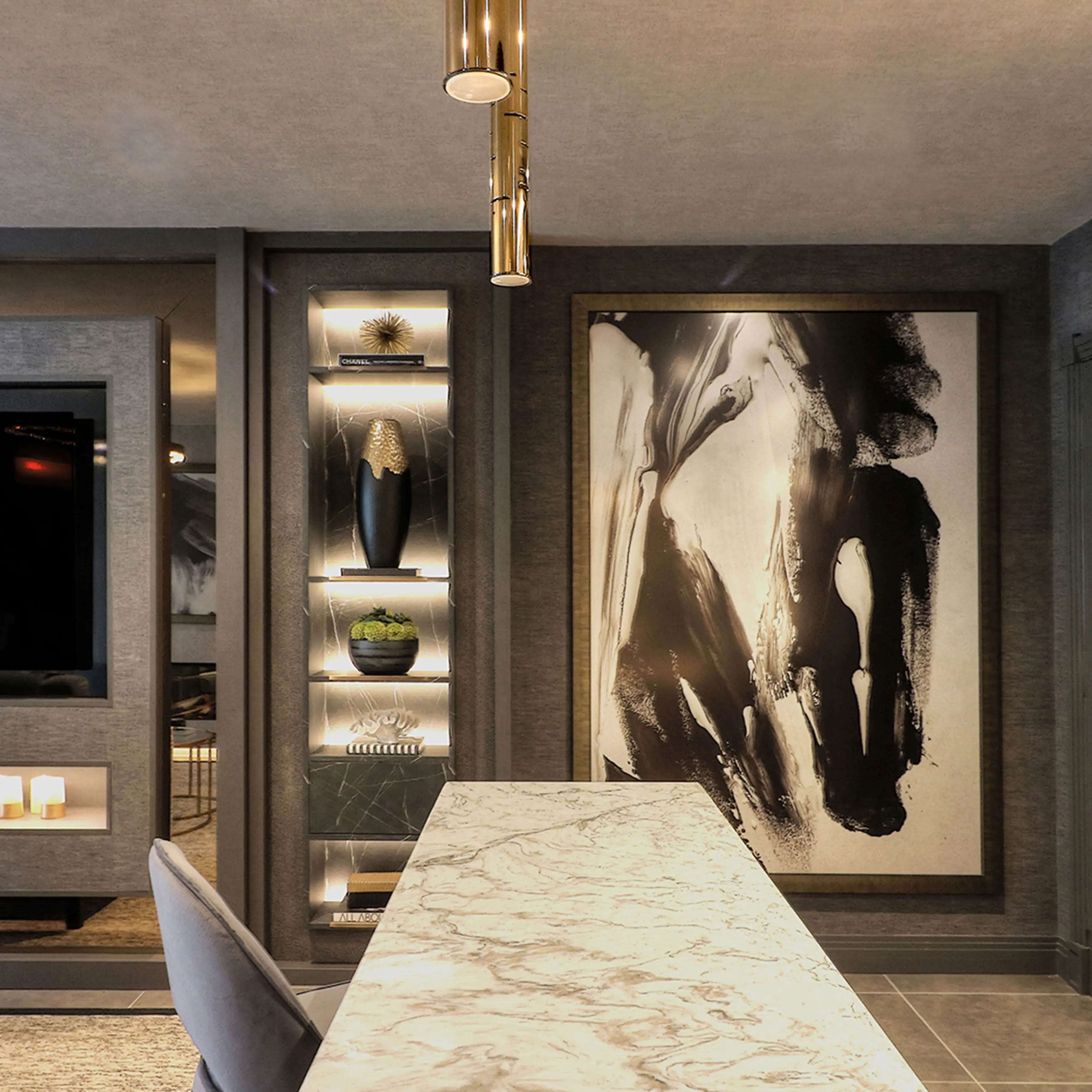 /storage/Luxury brass Gio pendant with geometric gold and nickel structure inspired by Italian modernist design.