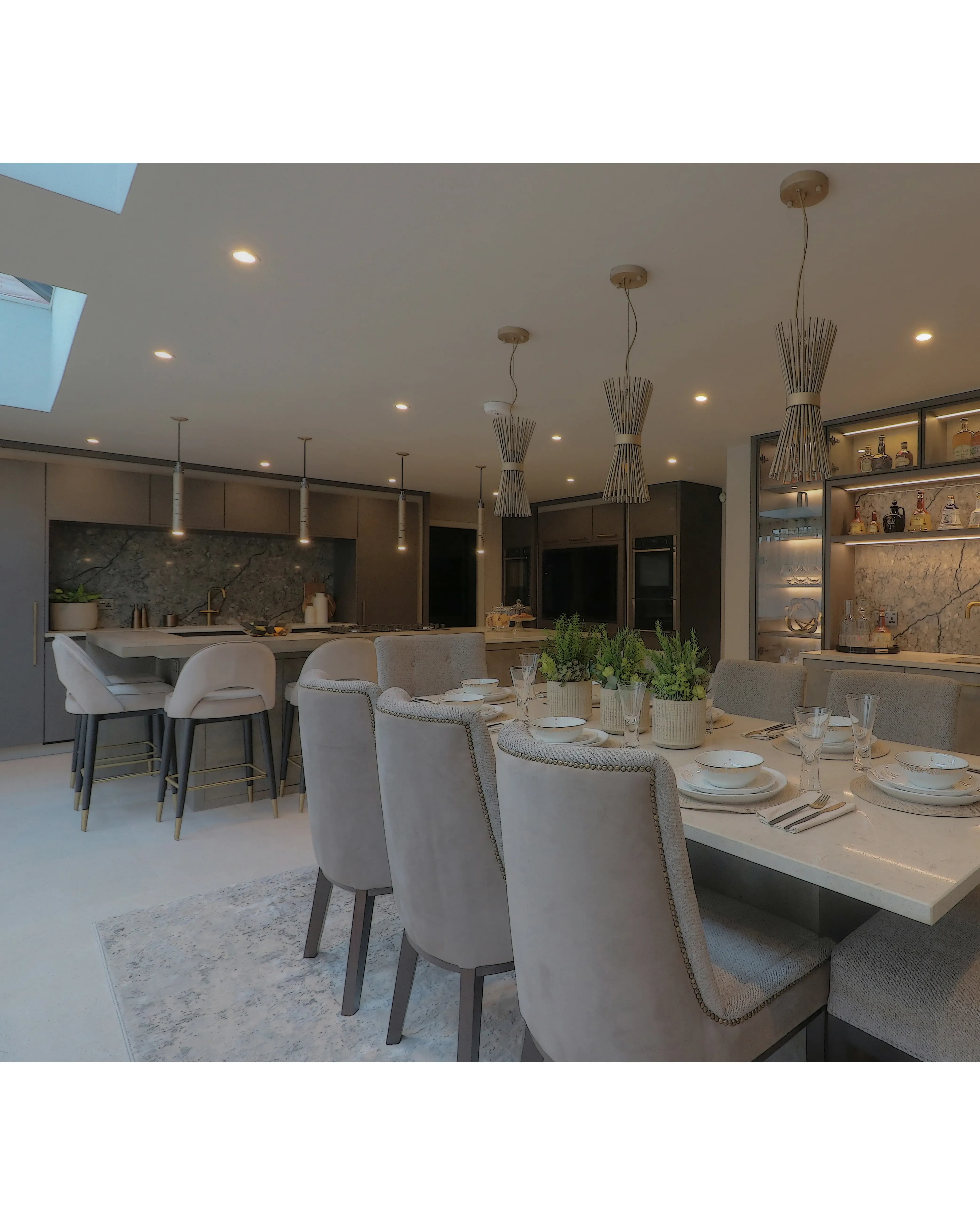 /storage/Luxury brass Gio pendant with geometric gold and nickel structure inspired by Italian modernist design.