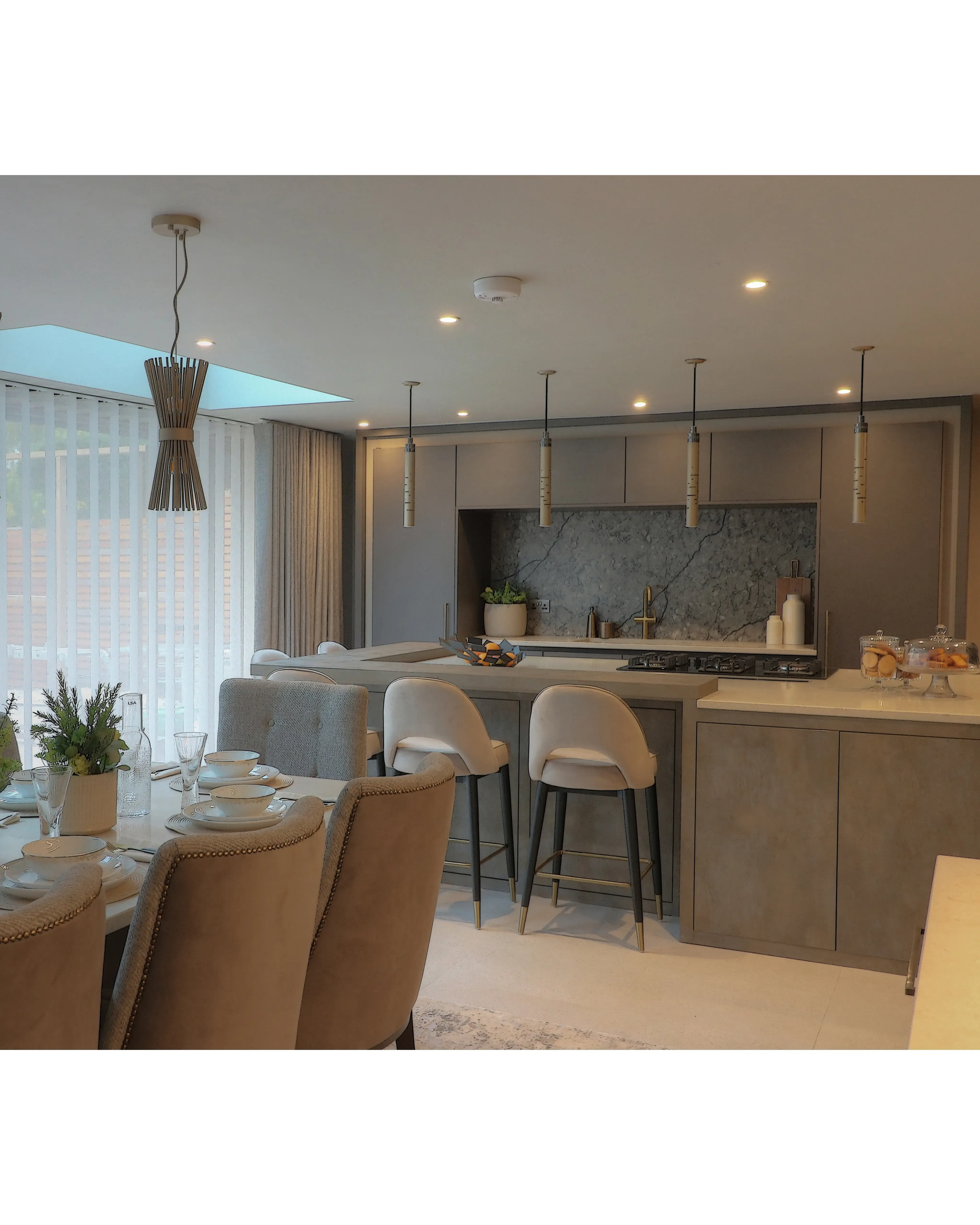 /storage/Luxury brass Gio pendant with geometric gold and nickel structure inspired by Italian modernist design.