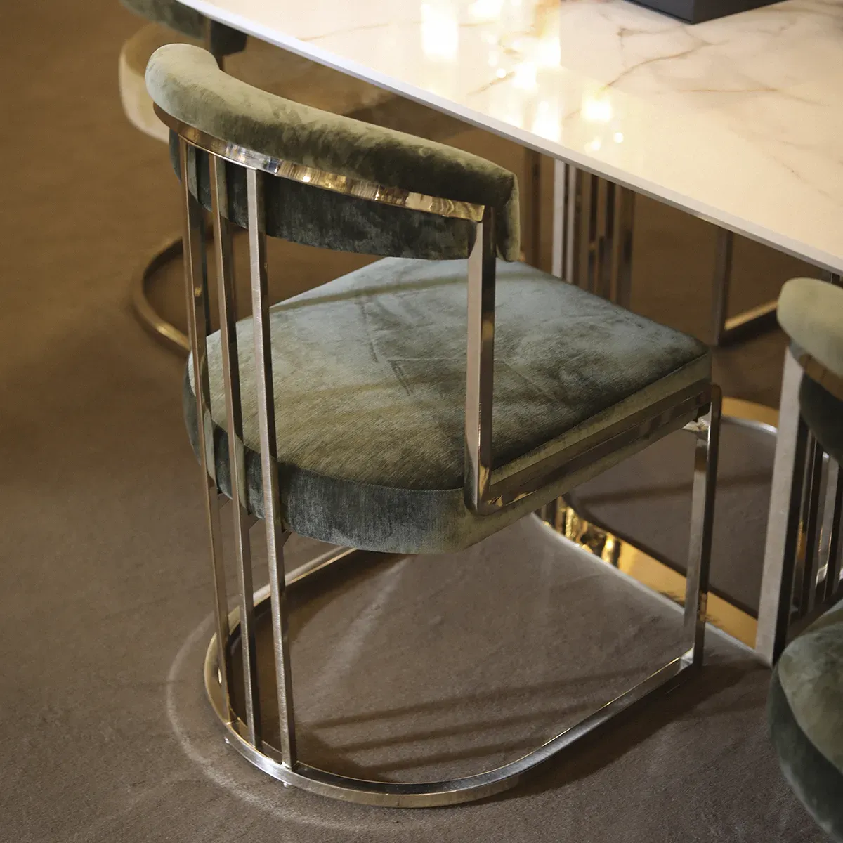 /storage/Luxury brass chair with elegant harp-shaped design by Castro Interiors.