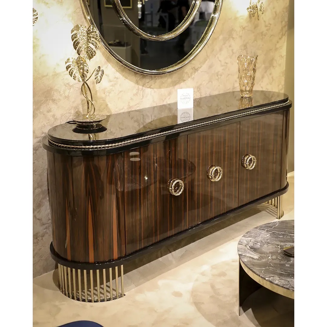 /storage/Luxury brass-accented Nautilus sideboard in ebony veneer with glass details, a modern classic design exuding naval inspiration and sophisticated elegance.