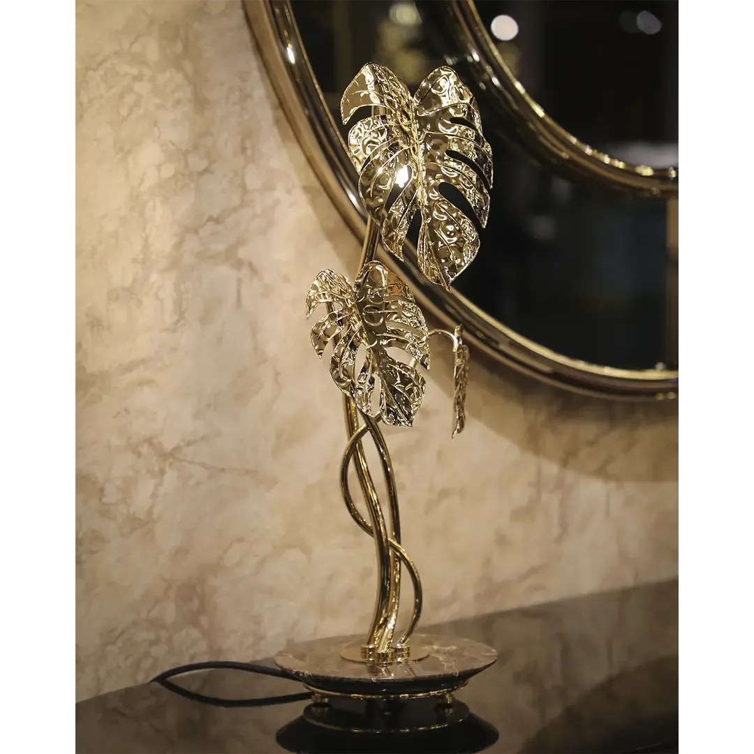 /storage/Luxury brass Rainforest floor lamp with handcrafted gold-plated brass, clear crystal glass, and nature-inspired details of raindrops and butterflies.