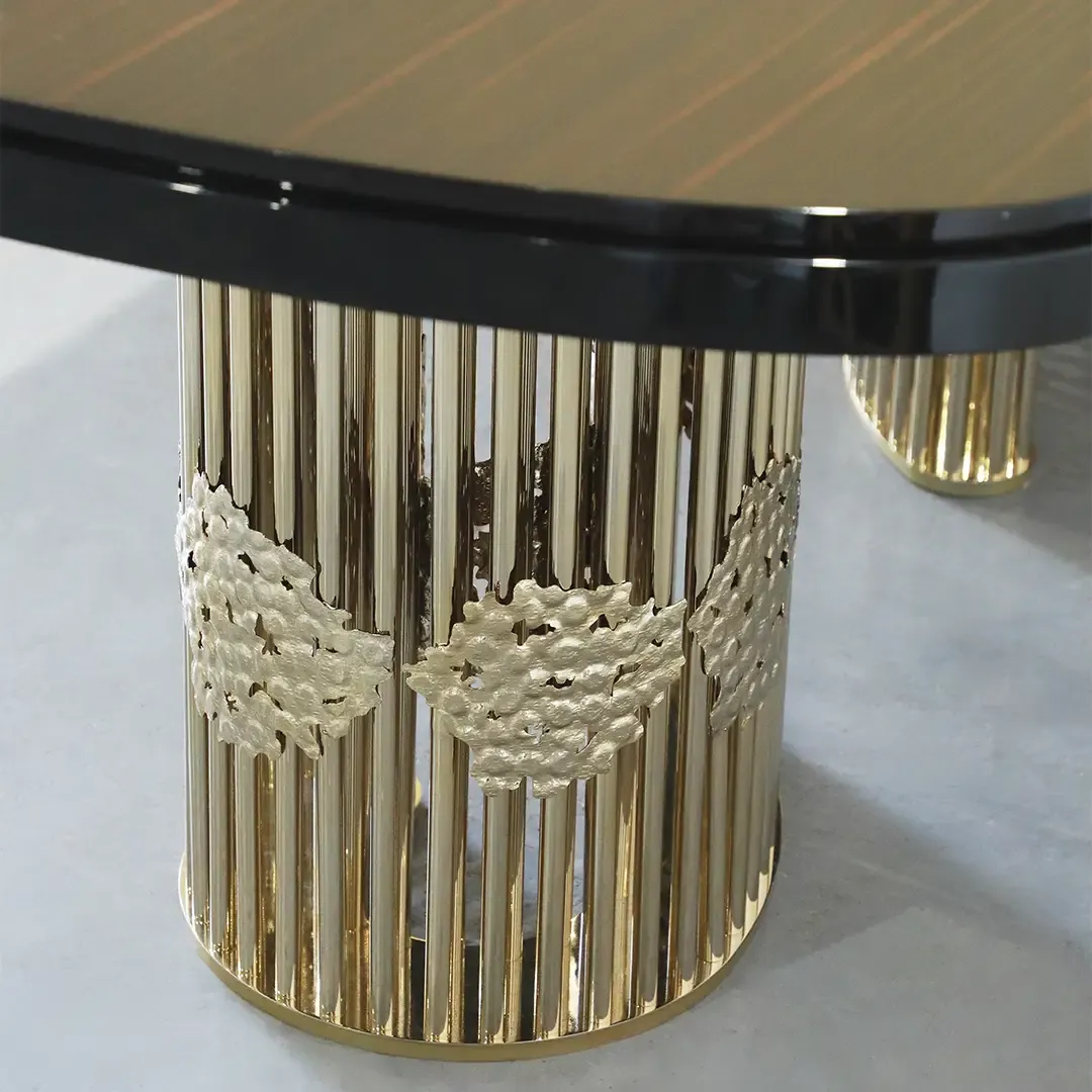 /storage/Magma Dining Table by Castro Lighting, a luxury dining table handcrafted in Portugal with a sculptural brass base inspired by molten magma and a refined tabletop for contemporary dining rooms.